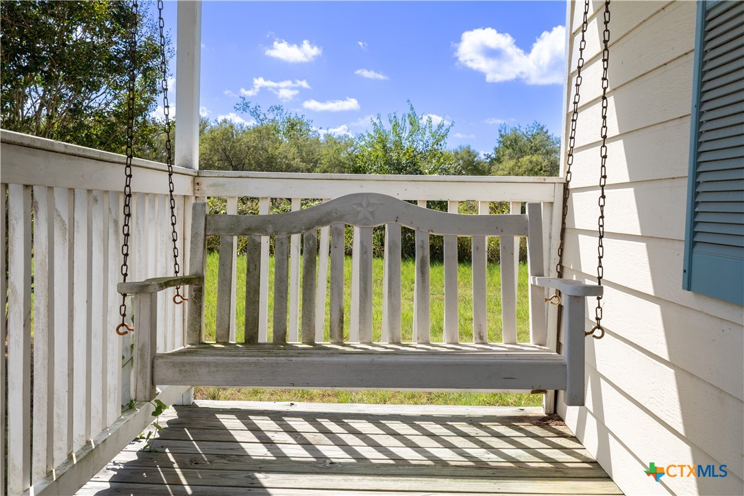 199 Sunset Trail Luling, TX 78648 - Photo 4 of 34 a view of a wooden balcony