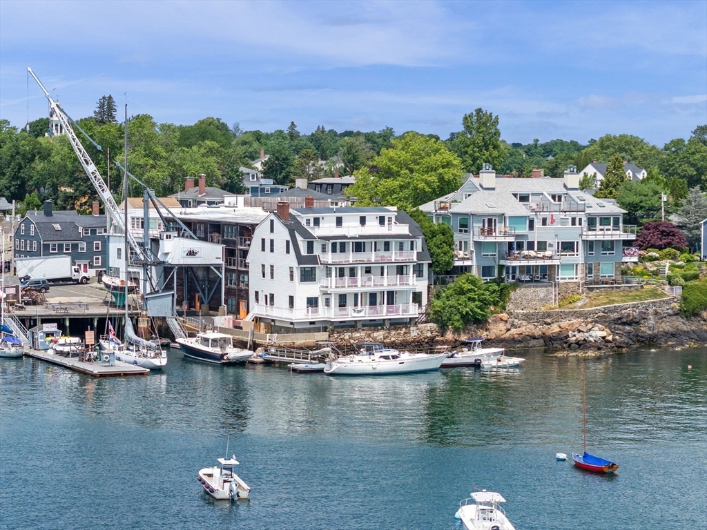 a view of houses with a lake view