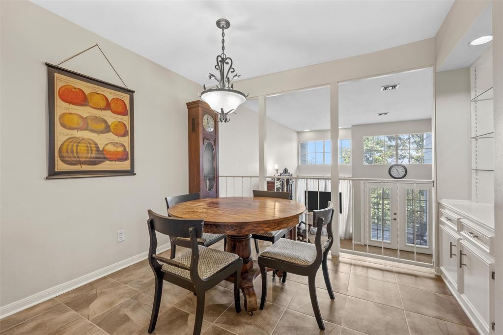 2901 Lake Shore Drive, Unit 405 Waco, TX 76708 - Photo 7 of 31 a dining room with furniture and window