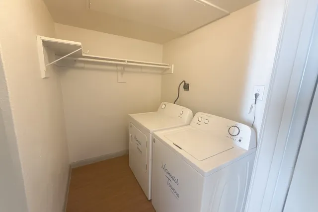 a kitchen with stainless steel appliances granite countertop a refrigerator a sink and a stove