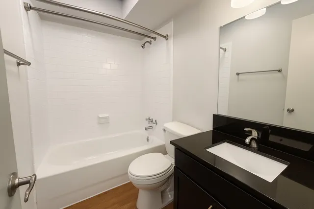 a view of empty room with floor to ceiling window