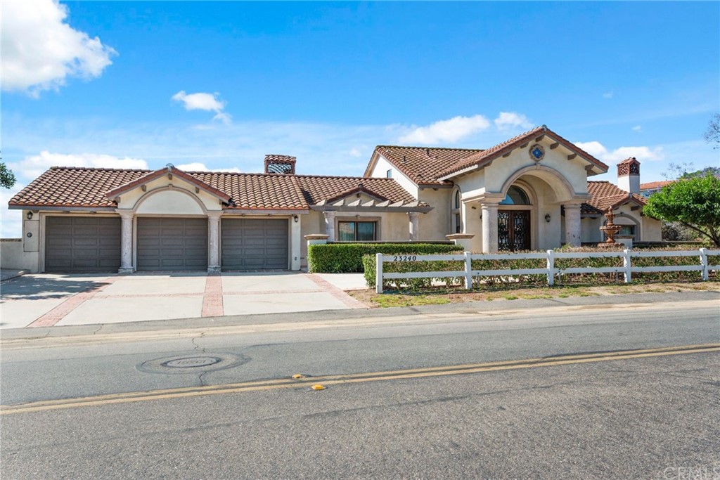 23240 Ridge Line Road Diamond Bar, CA 91765 - Photo 1 of 1 a front view of a house with a yard