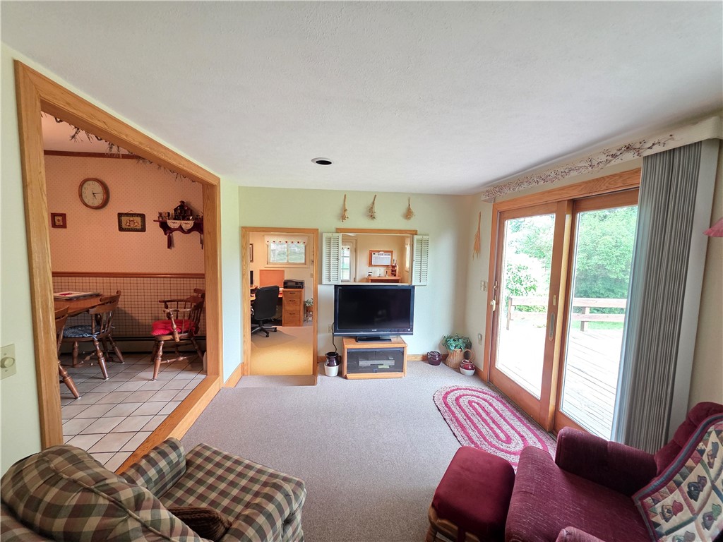 7910 Route 49 Osceola Twp Pa Osceola, PA 16942 - Photo 16 of 49 Sliding Doors take you outback to the deck