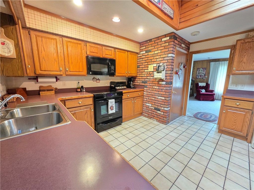 7910 Route 49 Osceola Twp Pa Osceola, PA 16942 - Photo 24 of 49 Through the kitchen