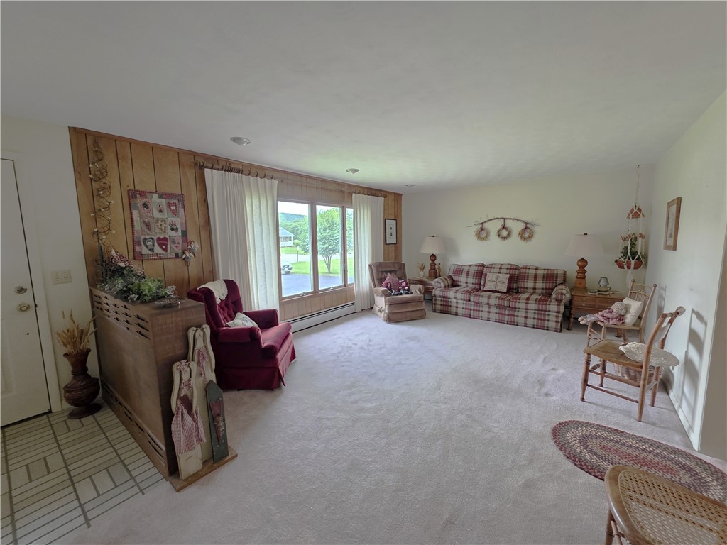 7910 Route 49 Osceola Twp Pa Osceola, PA 16942 - Photo 25 of 49 To the Livingroom