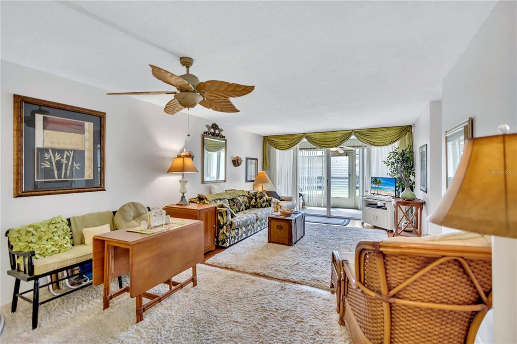 12300 Vonn Road, Unit 1102 Largo, FL 33774 - Photo 11 of 45 a living room with furniture