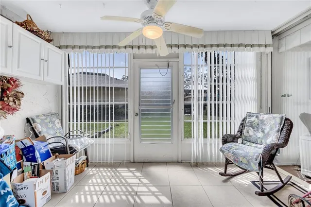 a bedroom with furniture and a chandelier
