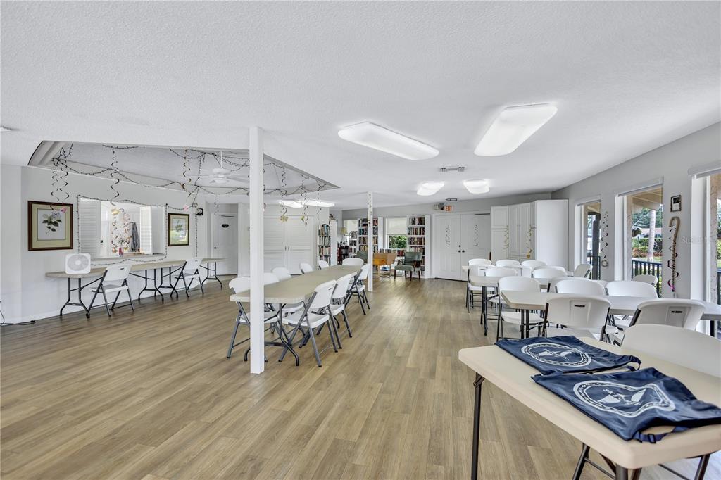 12300 Vonn Road, Unit 1102 Largo, FL 33774 - Photo 32 of 45 a living room with furniture and wooden floor