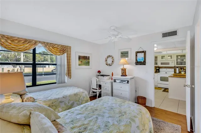 a bed room with a bed and furniture