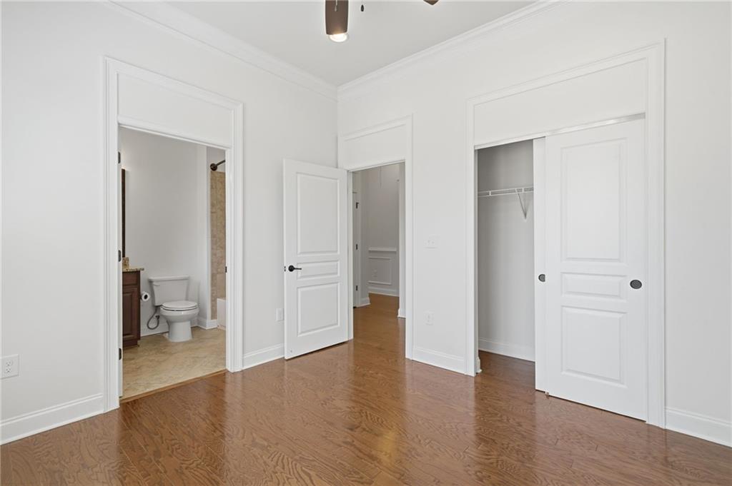 655 Hemlock Trail Canton, GA 30114 - Photo 17 of 58 an empty room and a bathroom with a sink