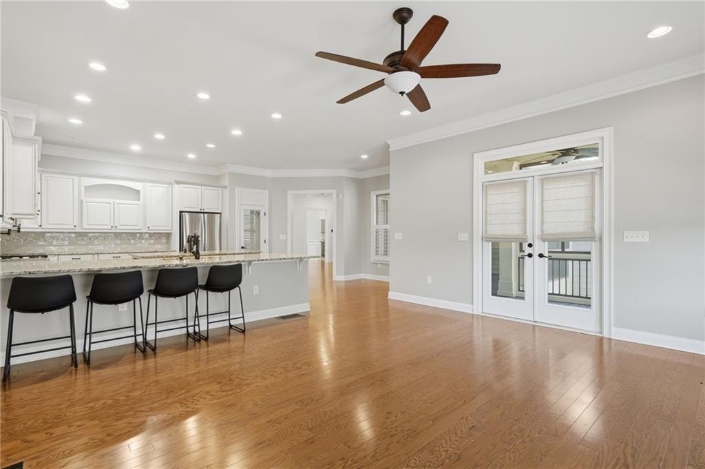 655 Hemlock Trail Canton, GA 30114 - Photo 35 of 58 a view of kitchen with furniture and wooden floor