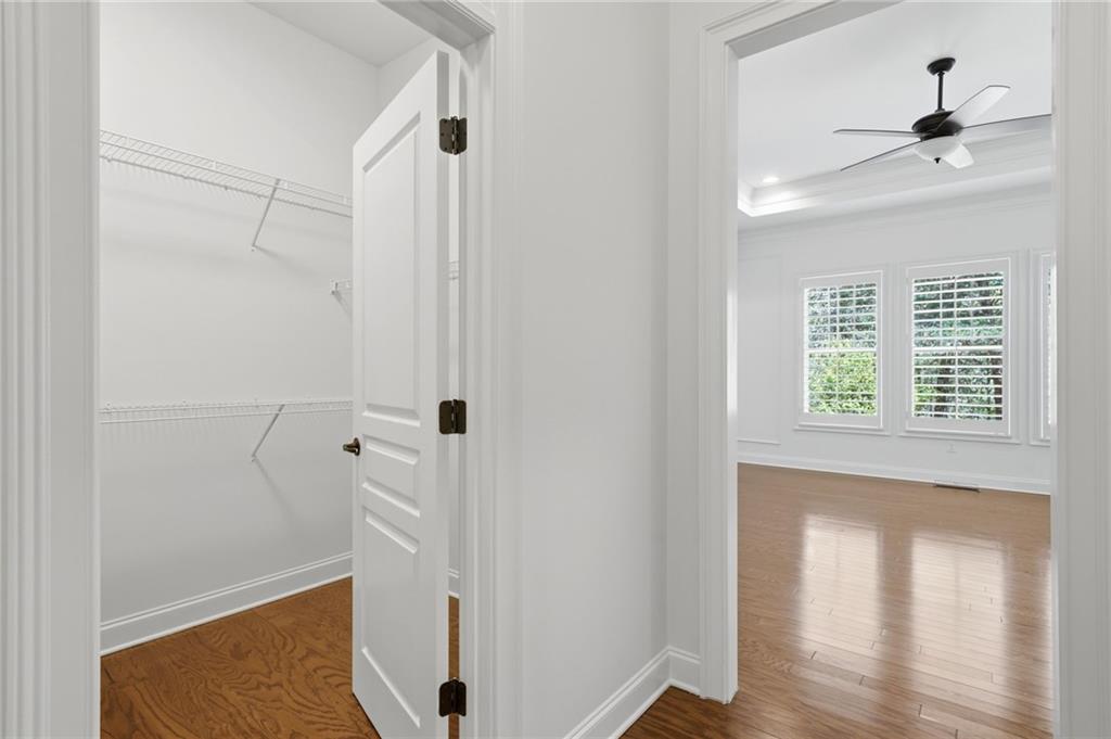 655 Hemlock Trail Canton, GA 30114 - Photo 40 of 58 a view of walk in closet with window