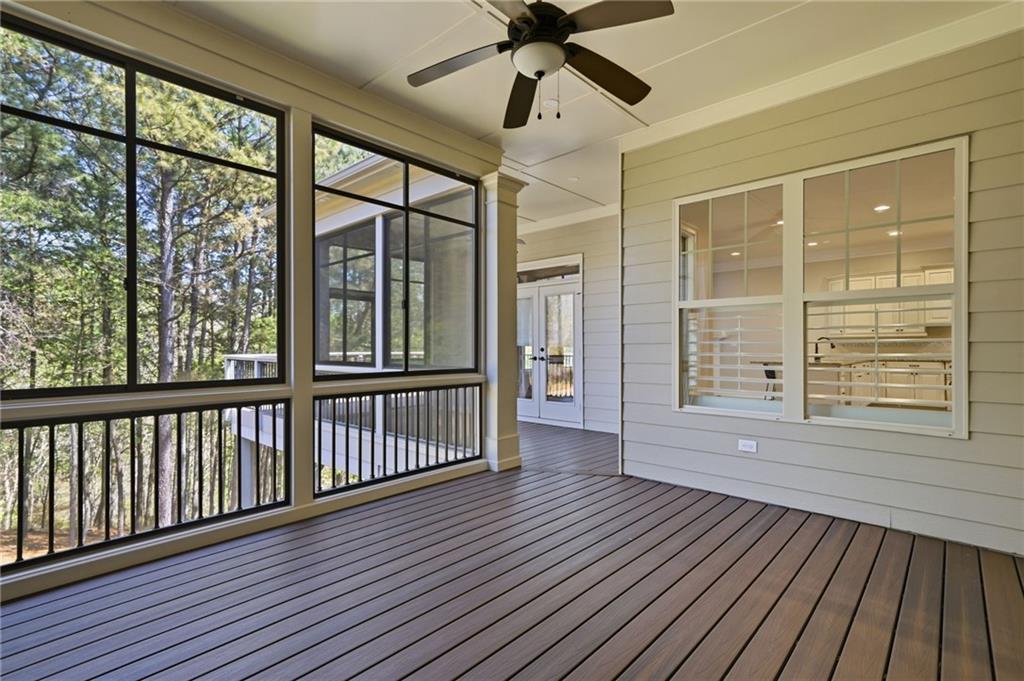 655 Hemlock Trail Canton, GA 30114 - Photo 44 of 58 a view of a room with wooden floor and windows