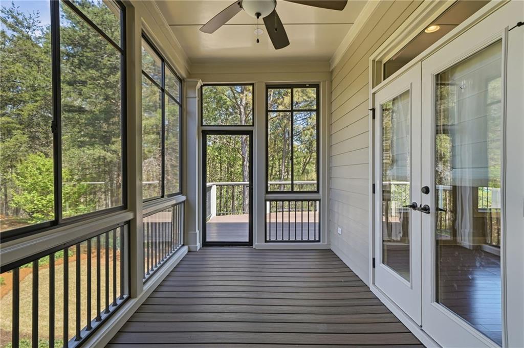 655 Hemlock Trail Canton, GA 30114 - Photo 45 of 58 a view of a balcony with wooden floor