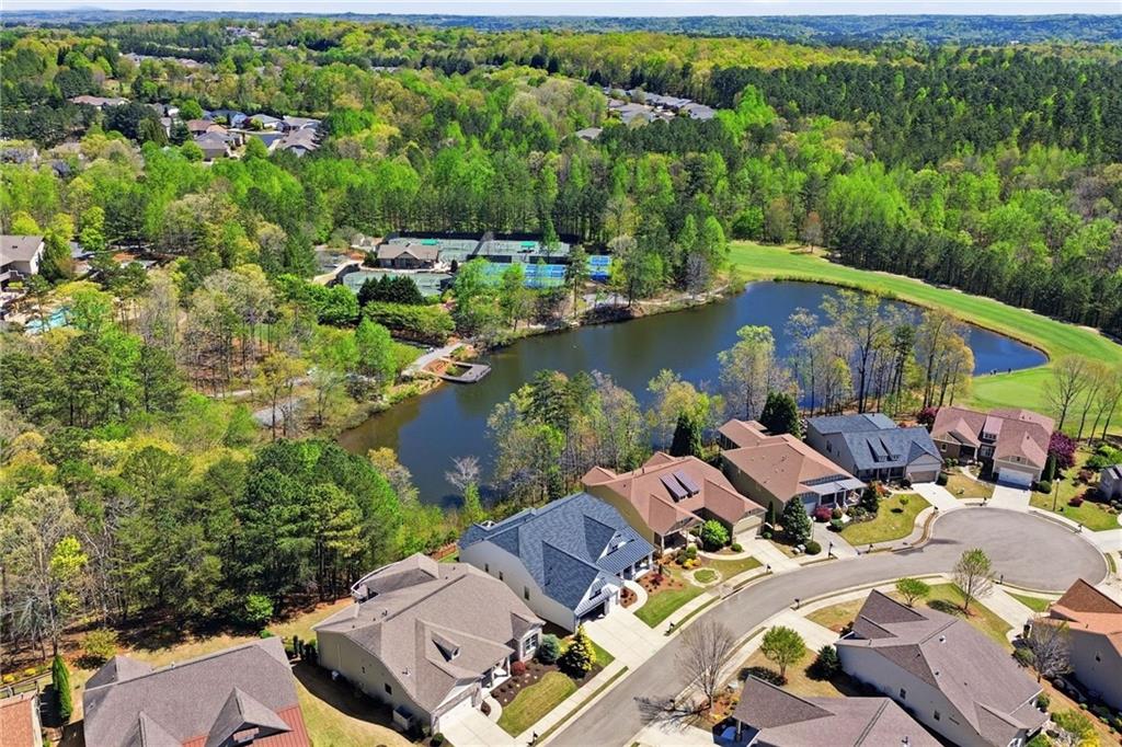 655 Hemlock Trail Canton, GA 30114 - Photo 5 of 58 an aerial view of a house with outdoor space and lake view