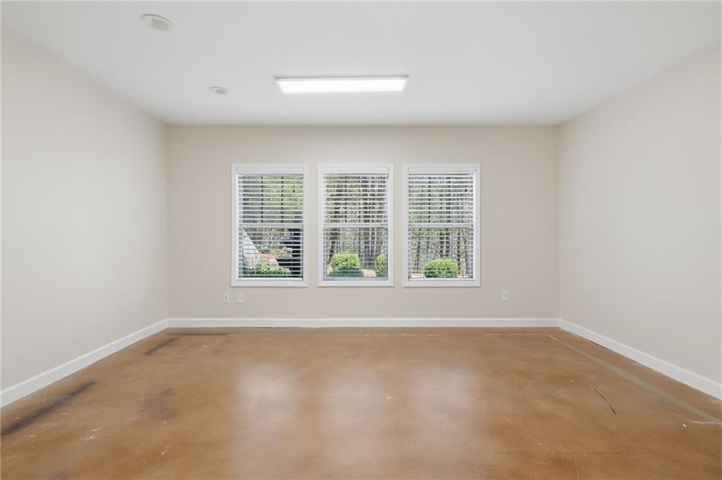 655 Hemlock Trail Canton, GA 30114 - Photo 51 of 58 an empty room with a window