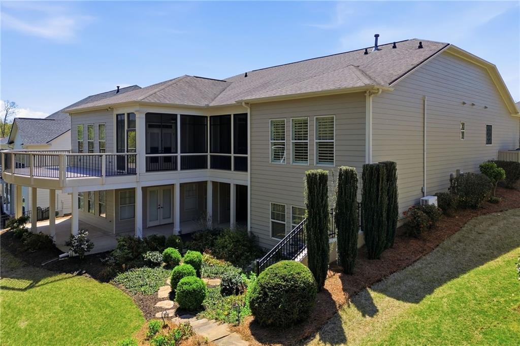 655 Hemlock Trail Canton, GA 30114 - Photo 55 of 58 a front view of a house with a yard