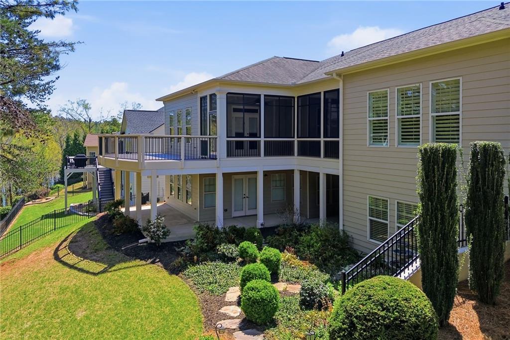 655 Hemlock Trail Canton, GA 30114 - Photo 56 of 58 a view of a house with backyard and sitting area