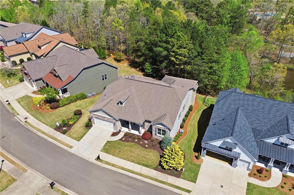 655 Hemlock Trail Canton, GA 30114 - Photo 8 of 58 an aerial view of a house with garden space and street view