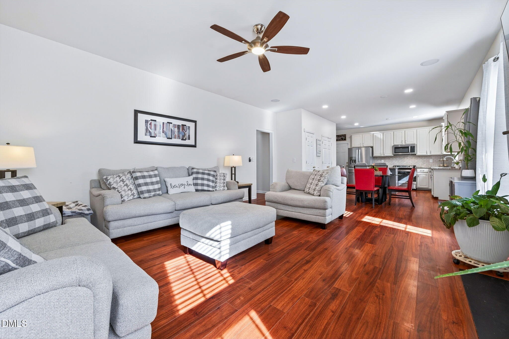 708 Quiet Walk Circle Rolesville, NC 27571 - Photo 13 of 56 a living room with furniture and a large window