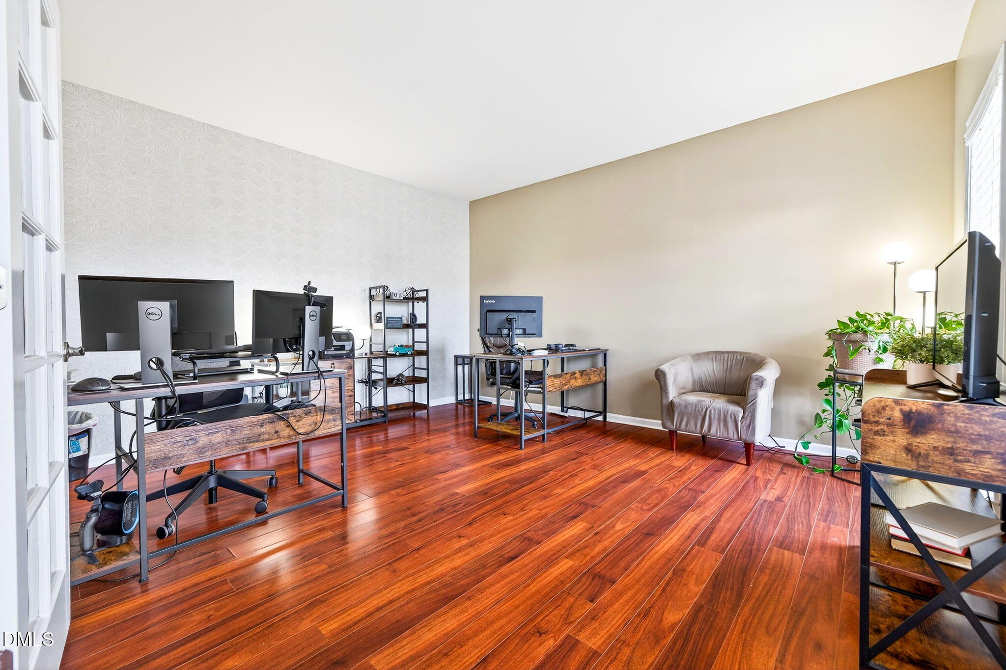 708 Quiet Walk Circle Rolesville, NC 27571 - Photo 18 of 56 a living room with furniture and a flat screen tv