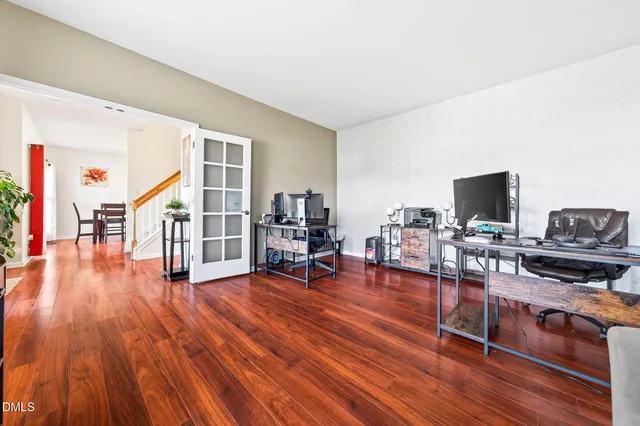a bedroom with furniture and window