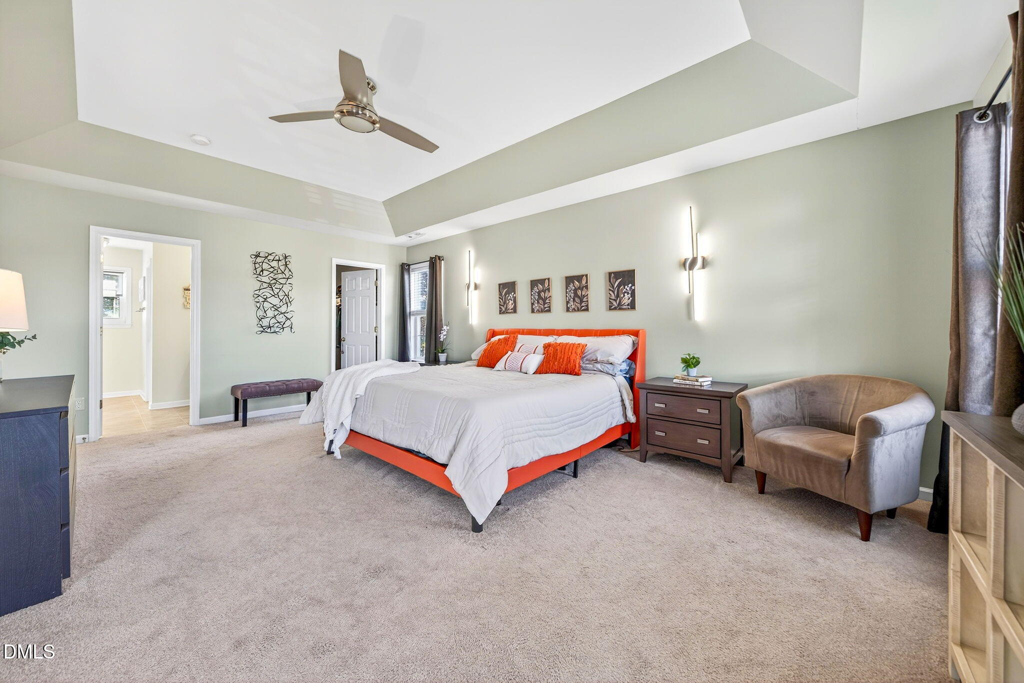 708 Quiet Walk Circle Rolesville, NC 27571 - Photo 25 of 56 a bedroom with a bed and lamp