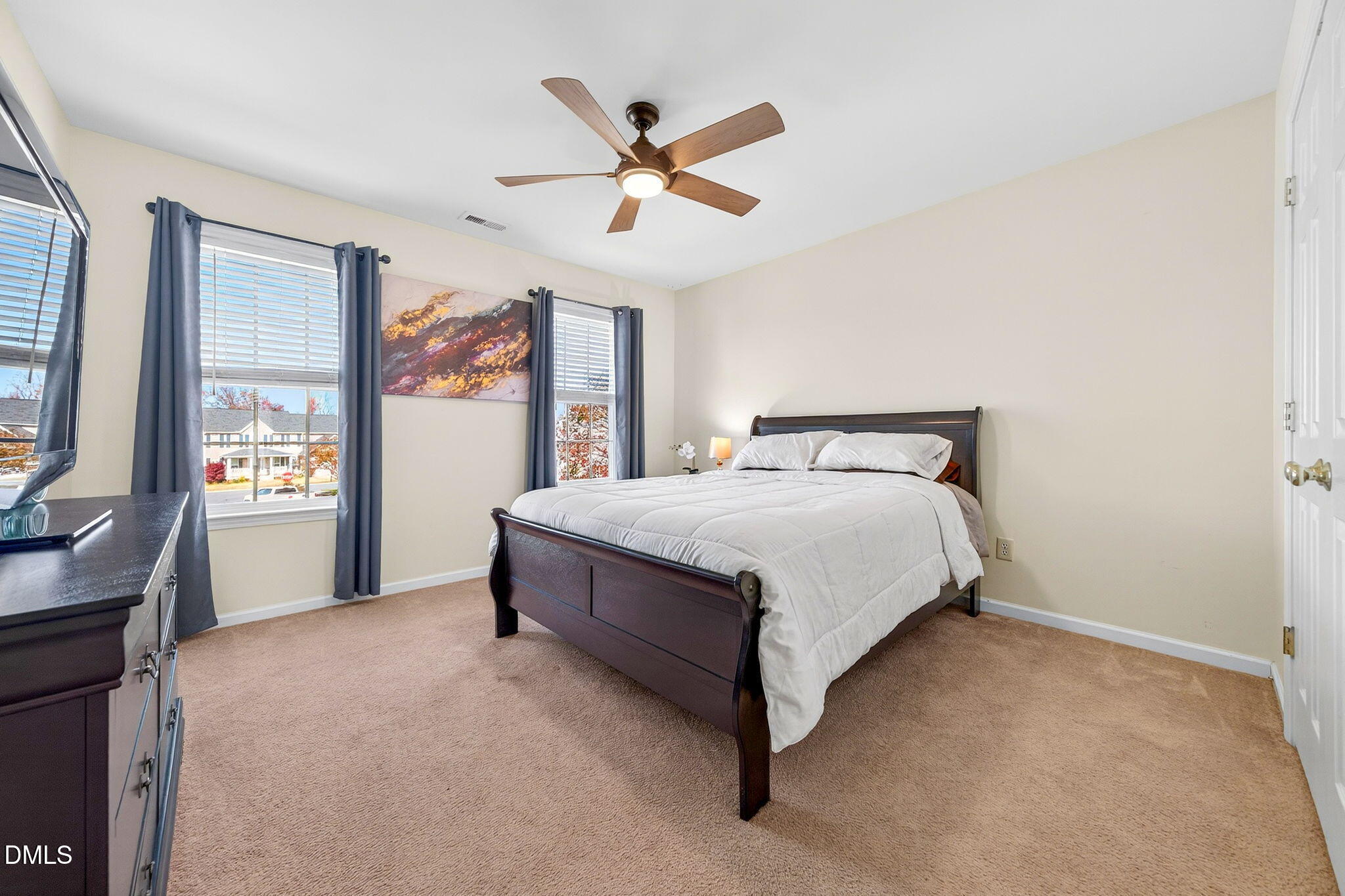 708 Quiet Walk Circle Rolesville, NC 27571 - Photo 31 of 56 a bedroom with a bed and window