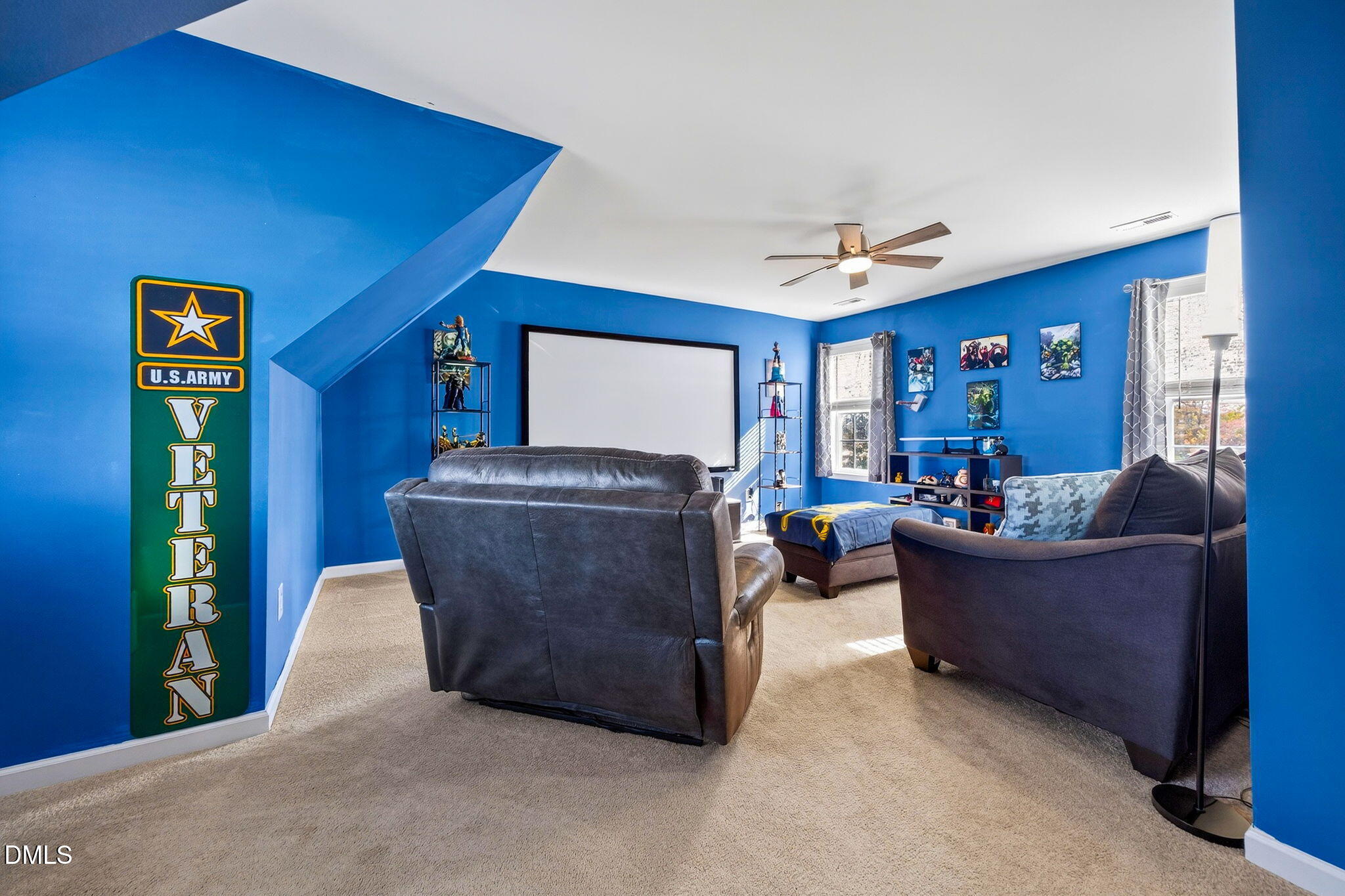 708 Quiet Walk Circle Rolesville, NC 27571 - Photo 37 of 56 a living room with furniture and a ceiling fan