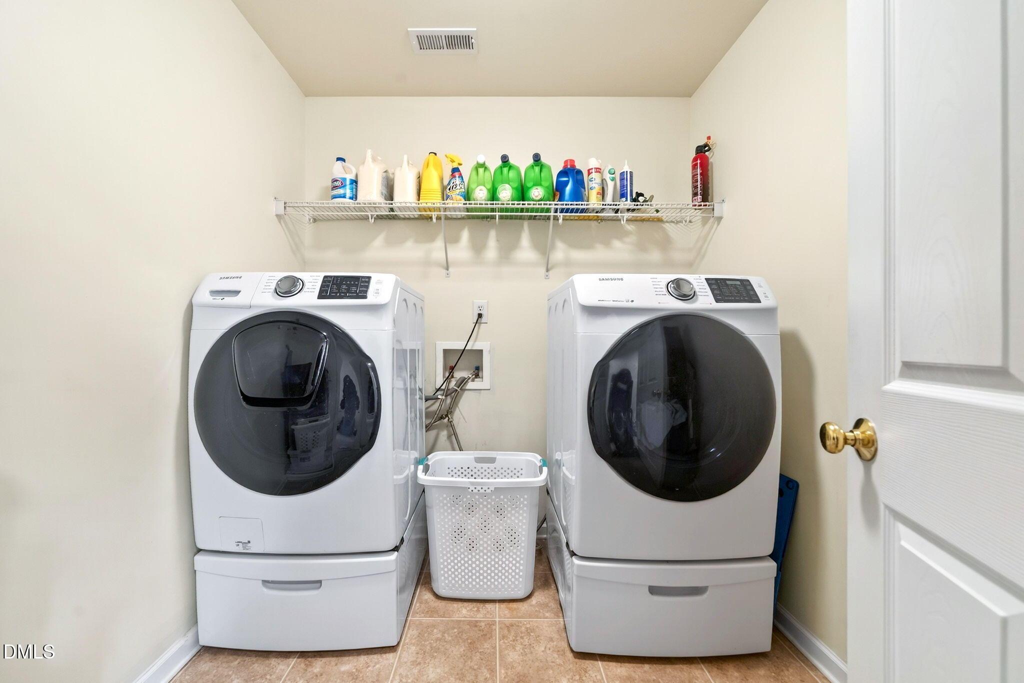 708 Quiet Walk Circle Rolesville, NC 27571 - Photo 38 of 56 a utility room with dryer and washer