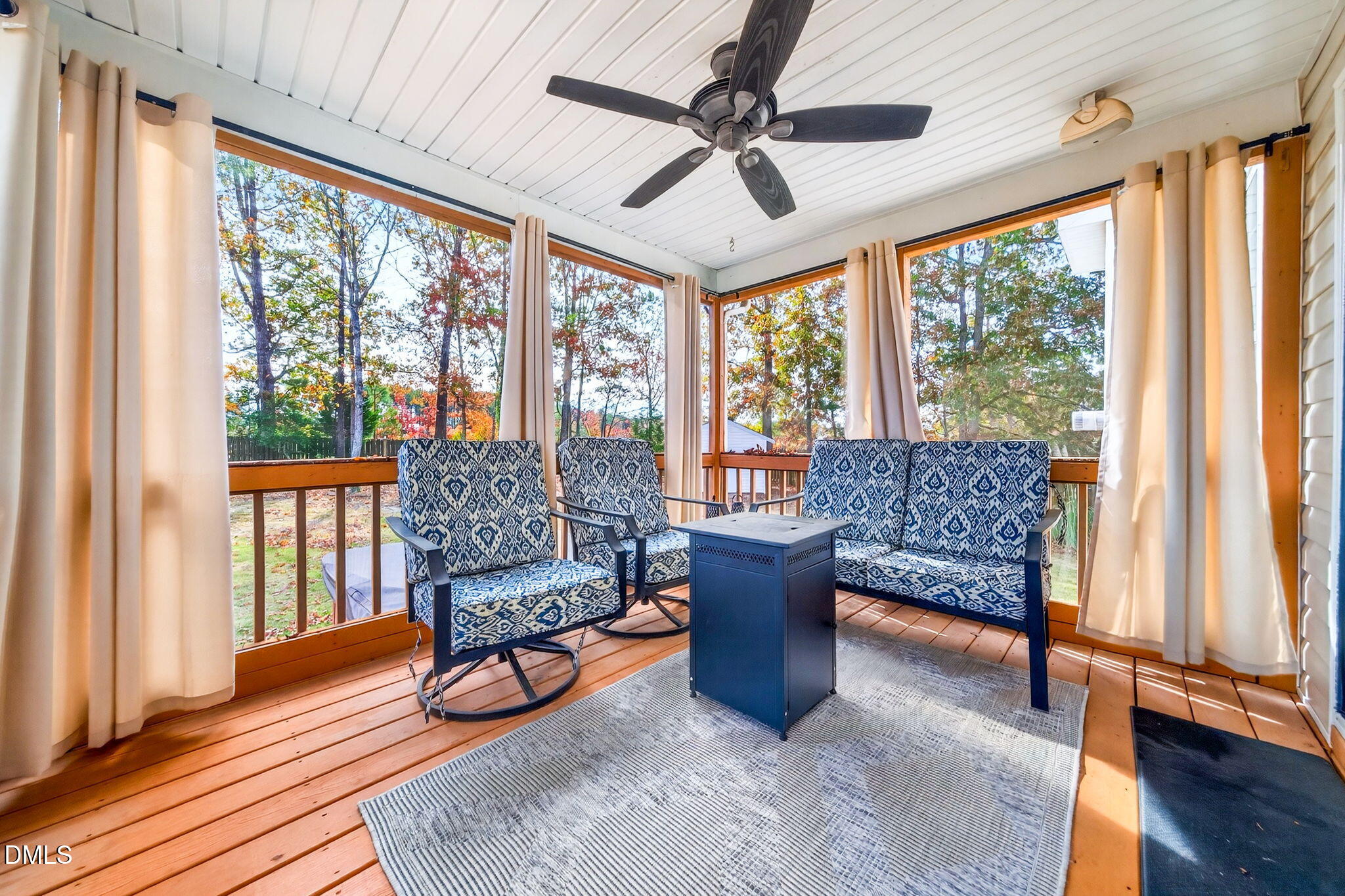 708 Quiet Walk Circle Rolesville, NC 27571 - Photo 40 of 56 a living room with furniture and a large window