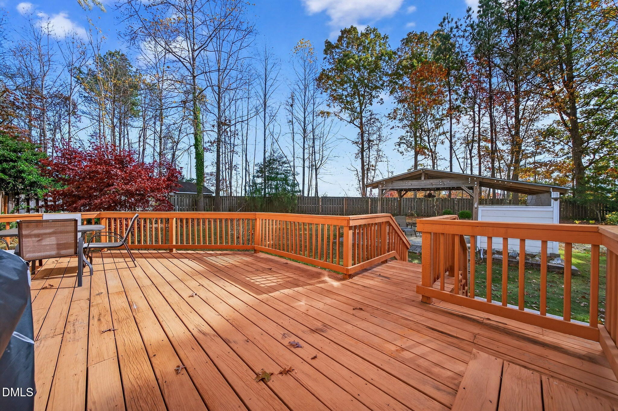 708 Quiet Walk Circle Rolesville, NC 27571 - Photo 42 of 56 a view of a roof deck with wooden floor and fence