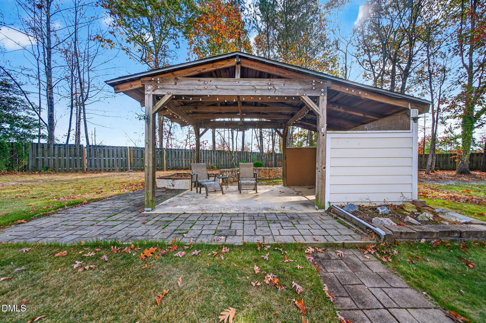 708 Quiet Walk Circle Rolesville, NC 27571 - Photo 47 of 56 a view of a backyard with a patio