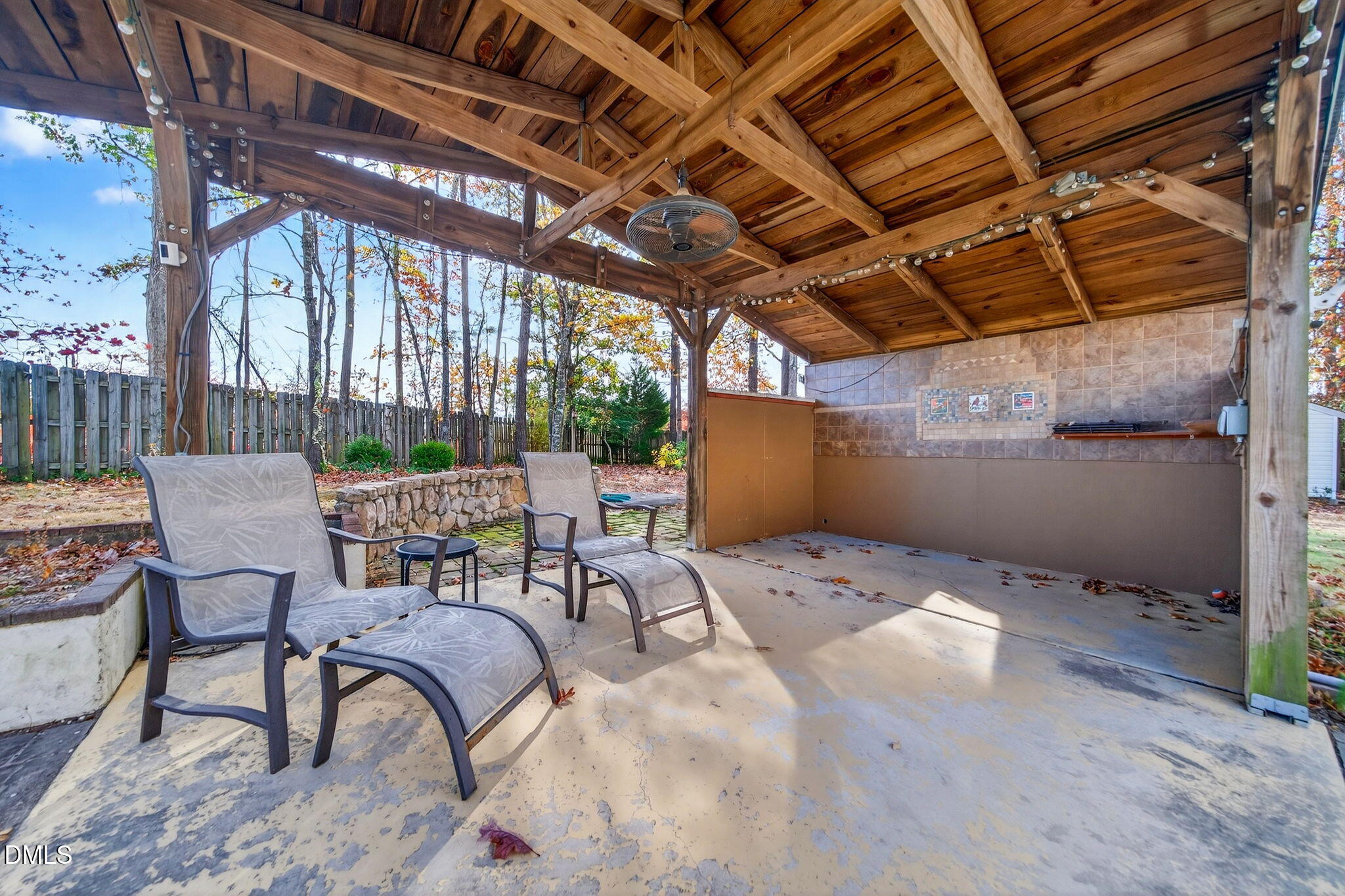 708 Quiet Walk Circle Rolesville, NC 27571 - Photo 48 of 56 a view of a backyard with sitting area