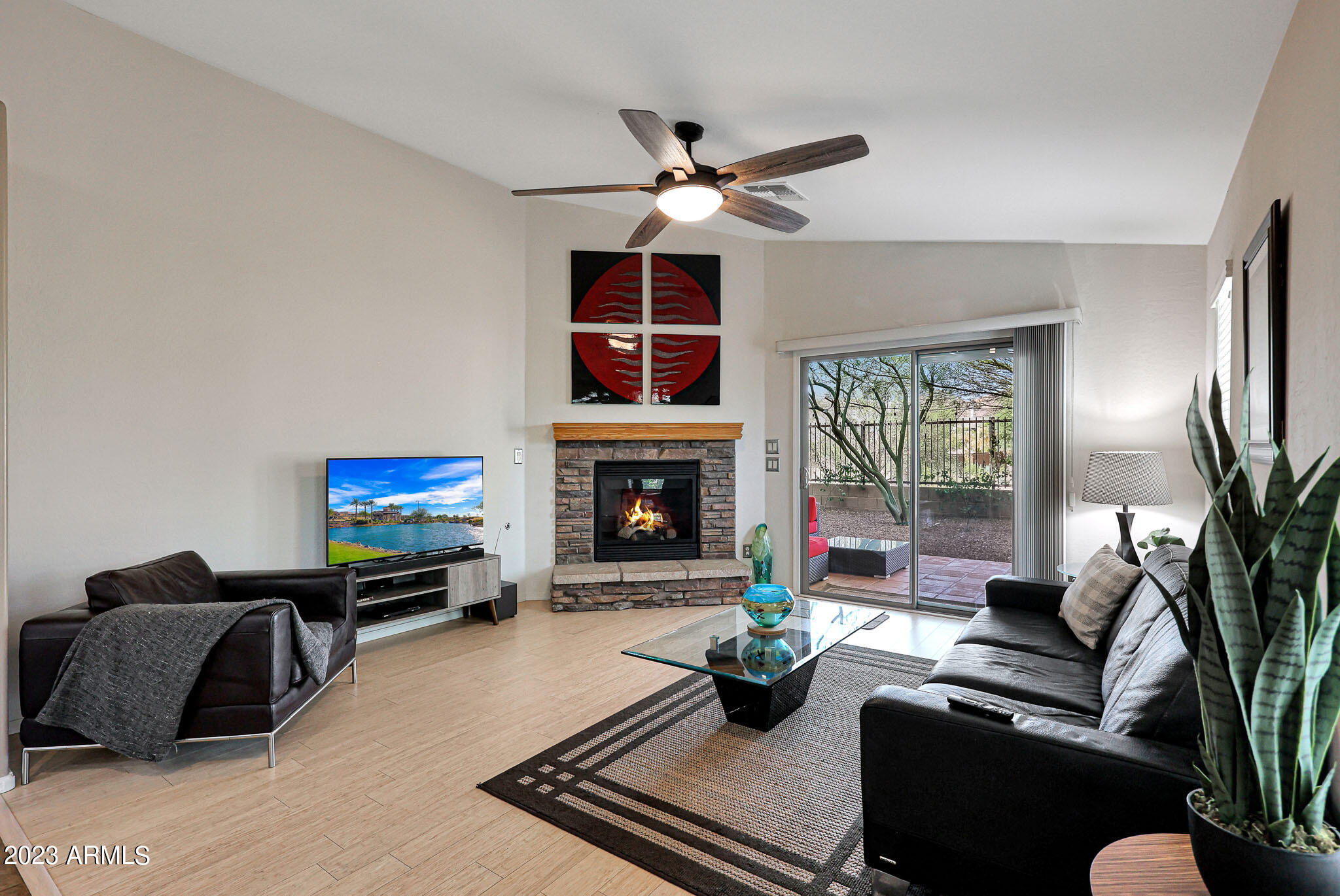2828 East Jj Ranch Road Phoenix, AZ 85024 - Photo 7 of 29 Family room w/ fireplace