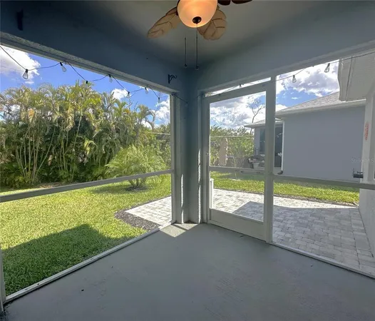 a view of a room with a large window