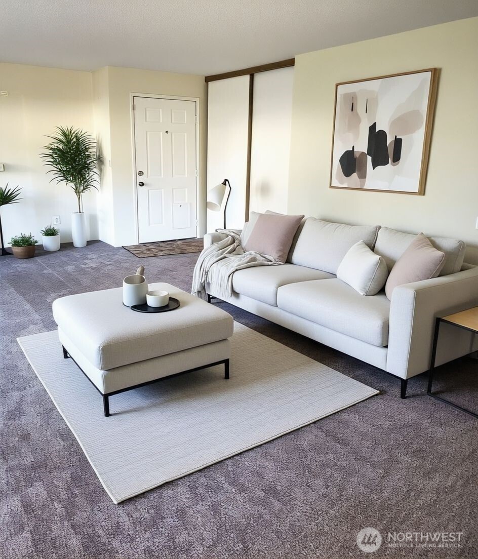 8854 Interlake Avenue North Seattle, WA 98103 - Photo 6 of 23 a living room with furniture and a potted plant