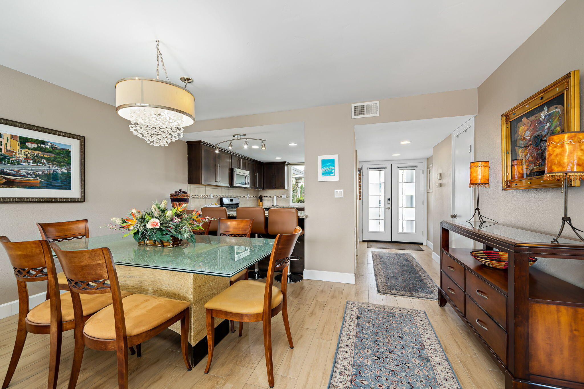 21 Toledo Drive Rancho Mirage, CA 92270 - Photo 12 of 35 a view of a dining room with furniture and chandelier