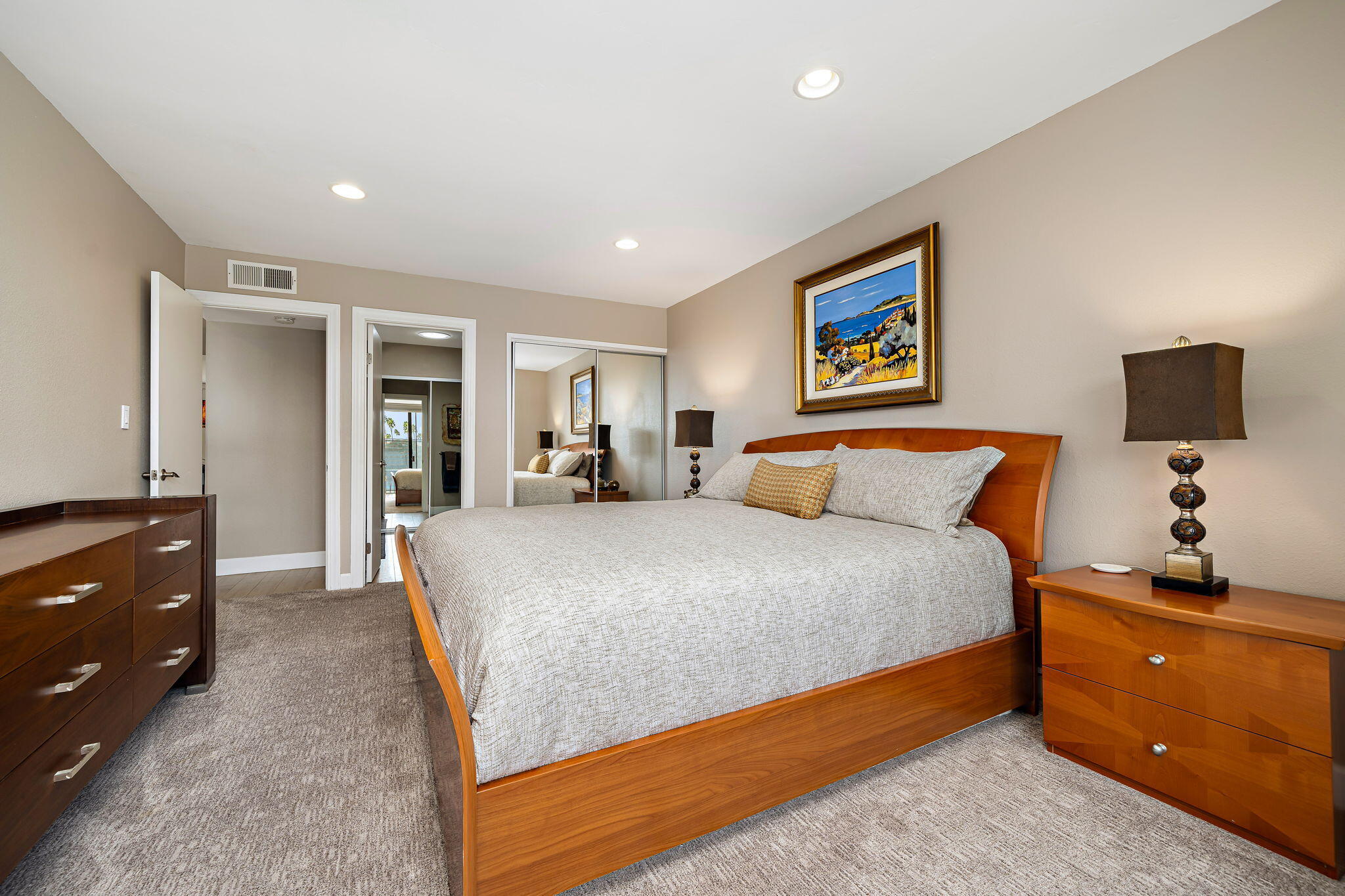 21 Toledo Drive Rancho Mirage, CA 92270 - Photo 18 of 35 a bed room with a bed and a night stand