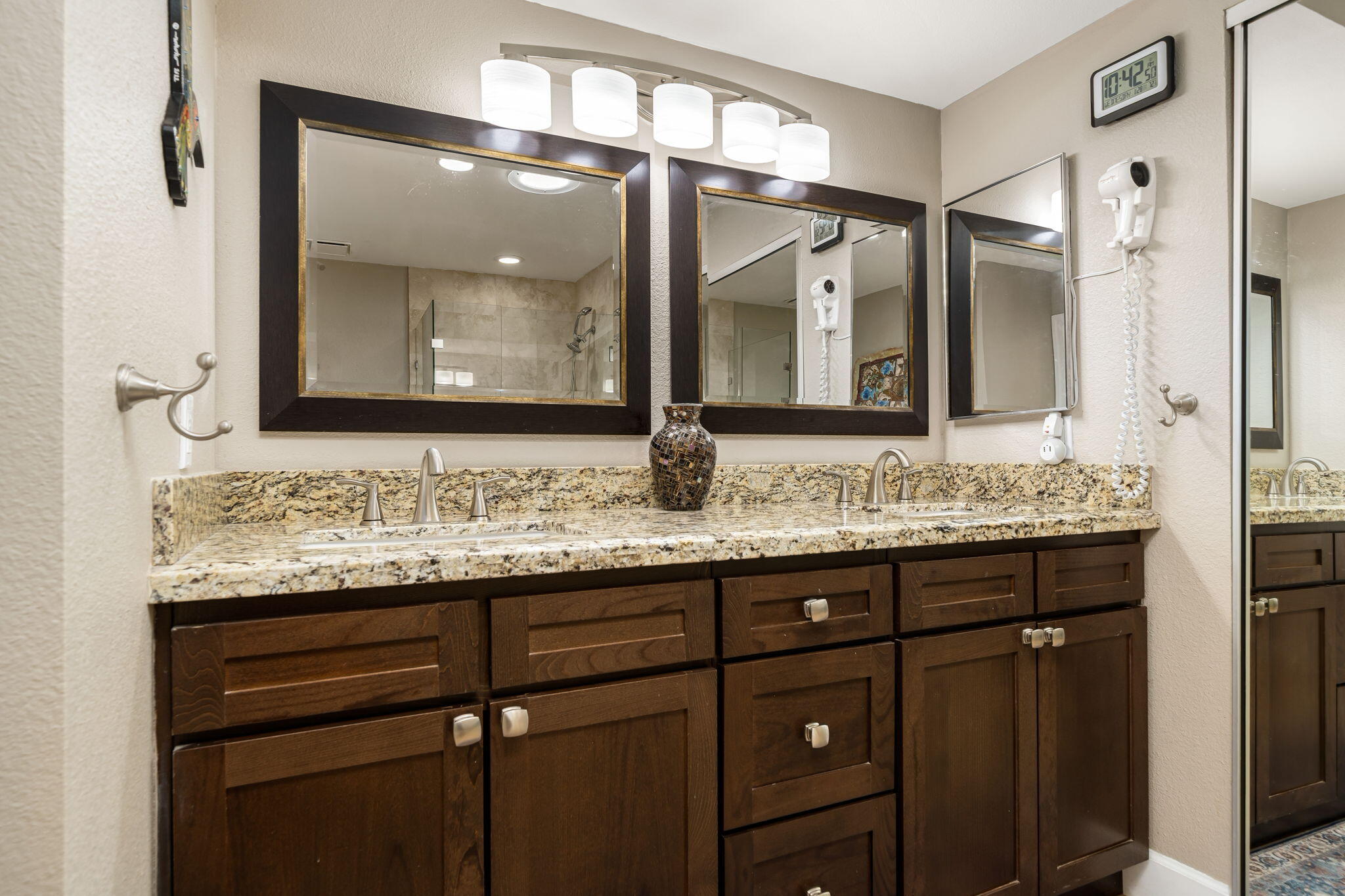 21 Toledo Drive Rancho Mirage, CA 92270 - Photo 19 of 35 a bathroom with a granite countertop sink vanity and mirror
