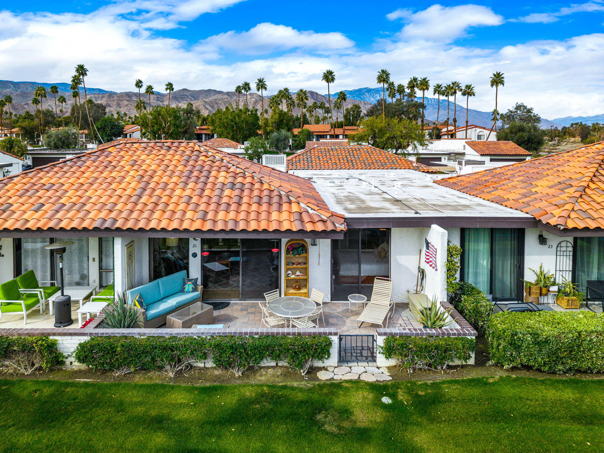 21 Toledo Drive Rancho Mirage, CA 92270 - Photo 27 of 35 a front view of a house with garden