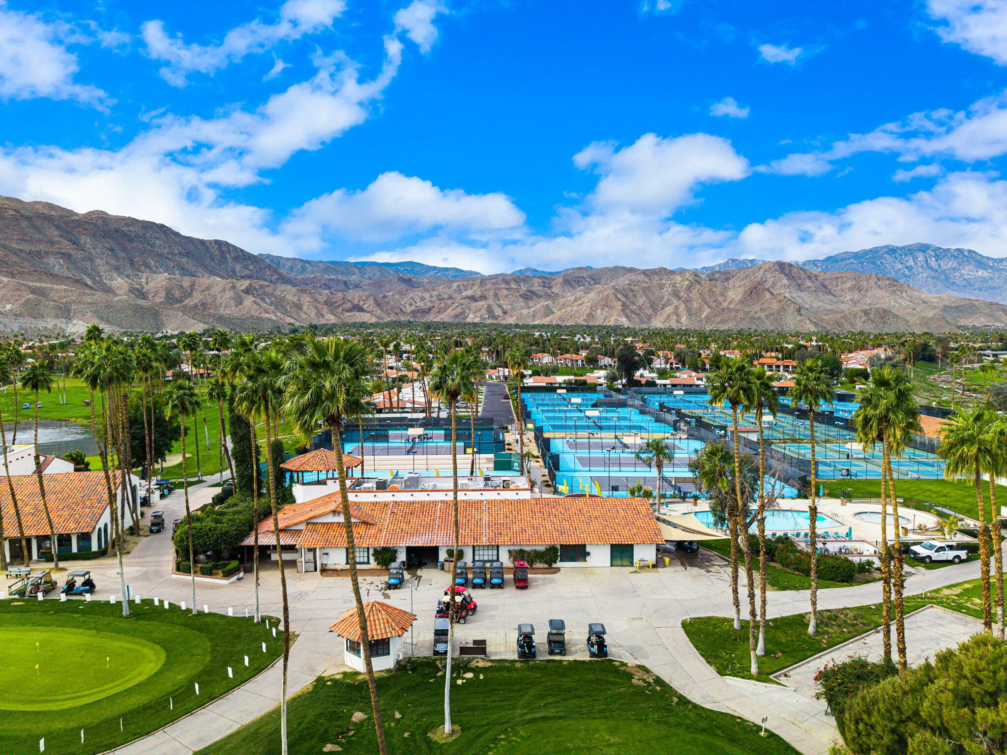 21 Toledo Drive Rancho Mirage, CA 92270 - Photo 33 of 35 a view of a swimming pool with lawn chairs