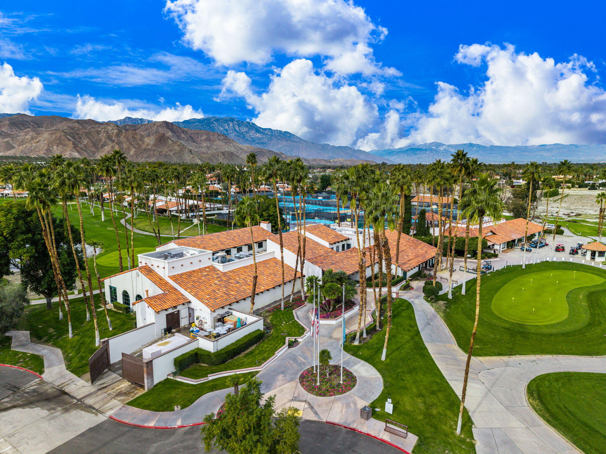 21 Toledo Drive Rancho Mirage, CA 92270 - Photo 34 of 35 an aerial view of a house with yard swimming pool and mountain view
