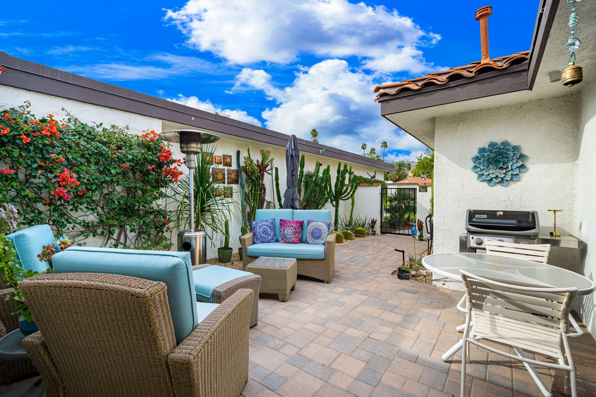 21 Toledo Drive Rancho Mirage, CA 92270 - Photo 6 of 35 a view of a chairs and tables in the patio