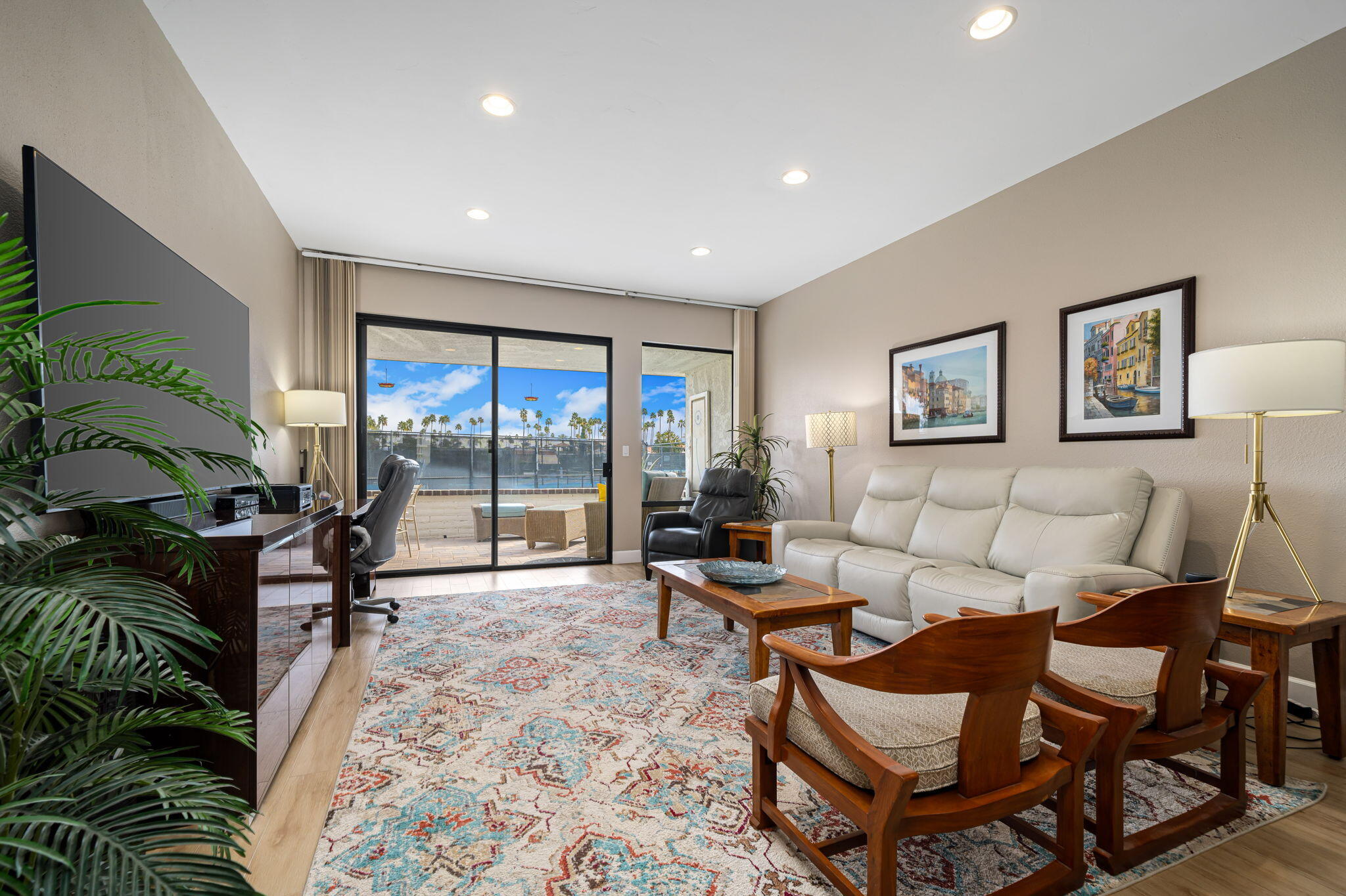 21 Toledo Drive Rancho Mirage, CA 92270 - Photo 9 of 35 a living room with furniture and a large window