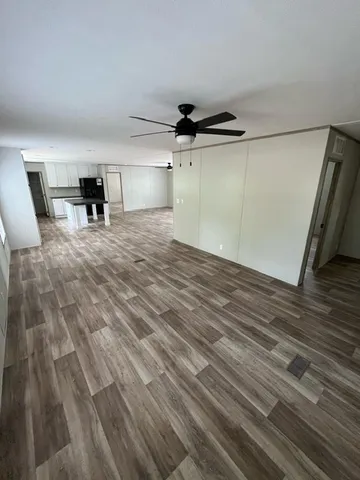 a kitchen with a stove and a refrigerator