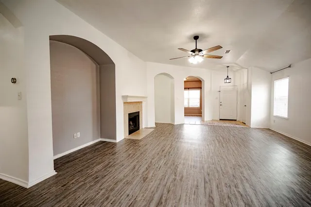 a view of a livingroom with wooden floor