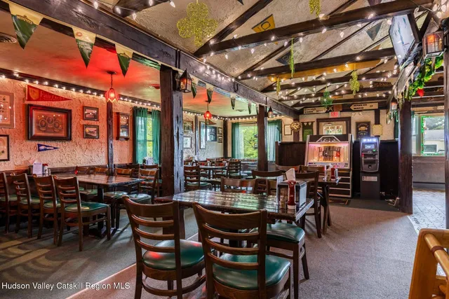 a view of a chairs and table in patio