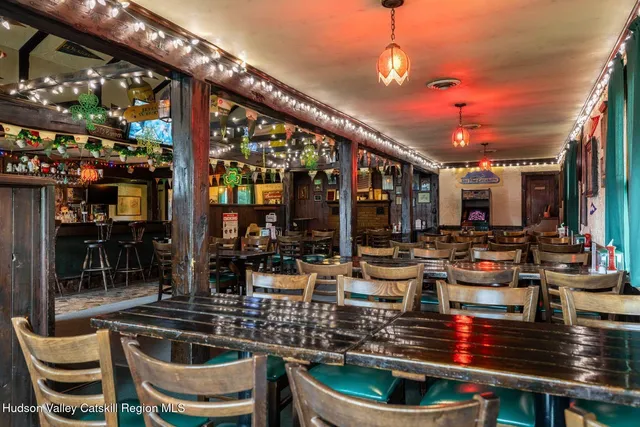 a view of a chairs and table in the patio