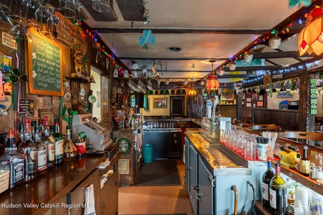 a view of swimming pool with a patio
